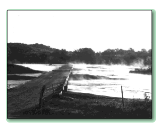 [A shared bridge over misty waters.]